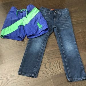 1 pair of boys swim trunks and 1 pair of jeans.